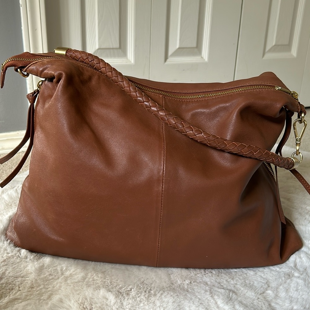 Beautiful soft brown leather purse by Silpada. Blakely Hobo style.